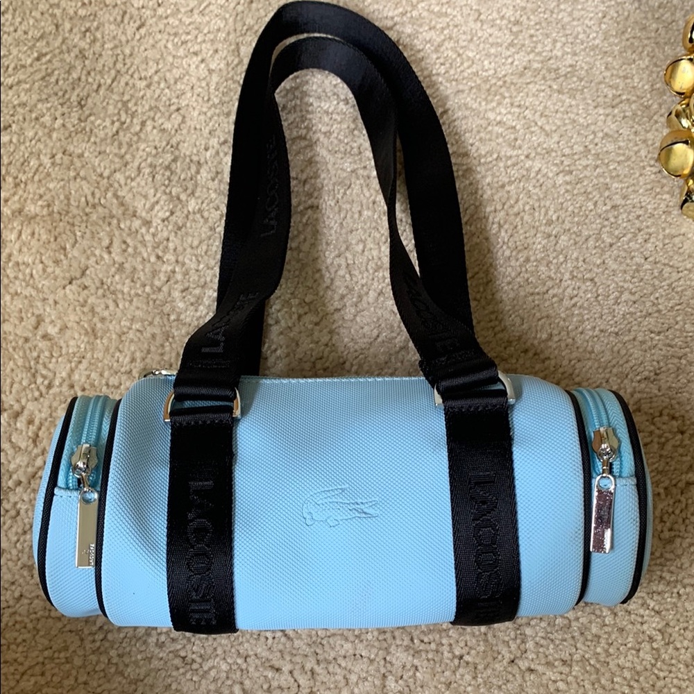 Lacoste Women's Light Blue Barrel Bag with Black Straps